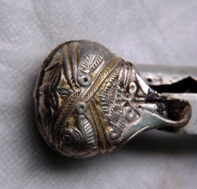 Sabre with silver fittings with floral ornaments